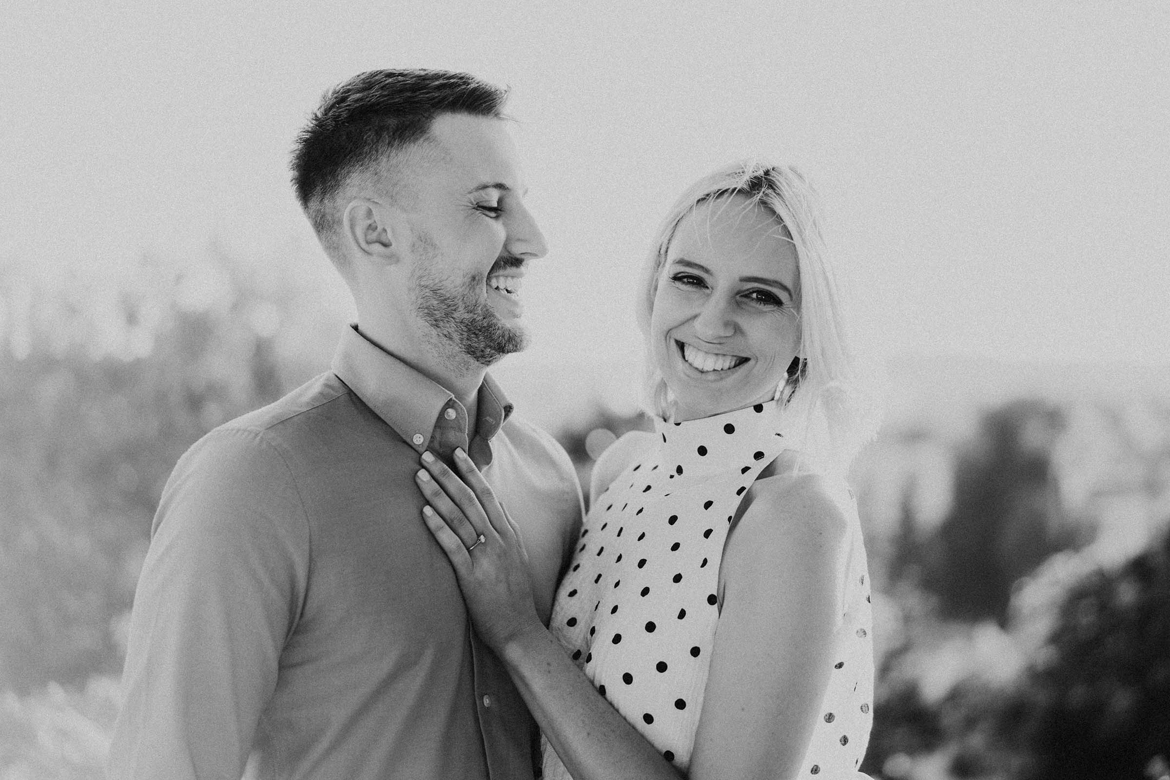 newly engaged couple photo in black and white