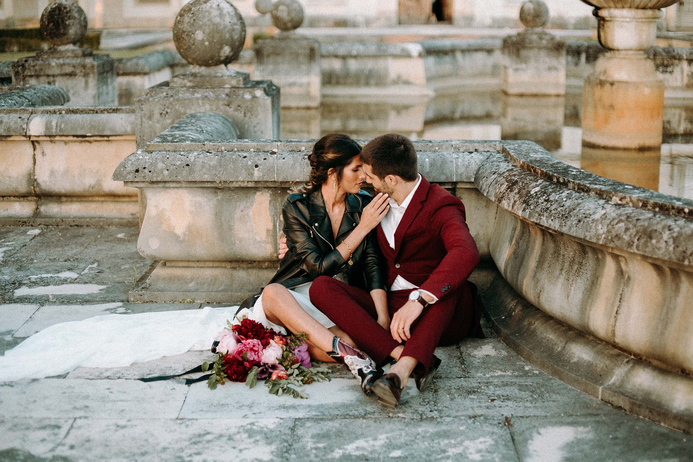 couple sitting on the floor with heads close