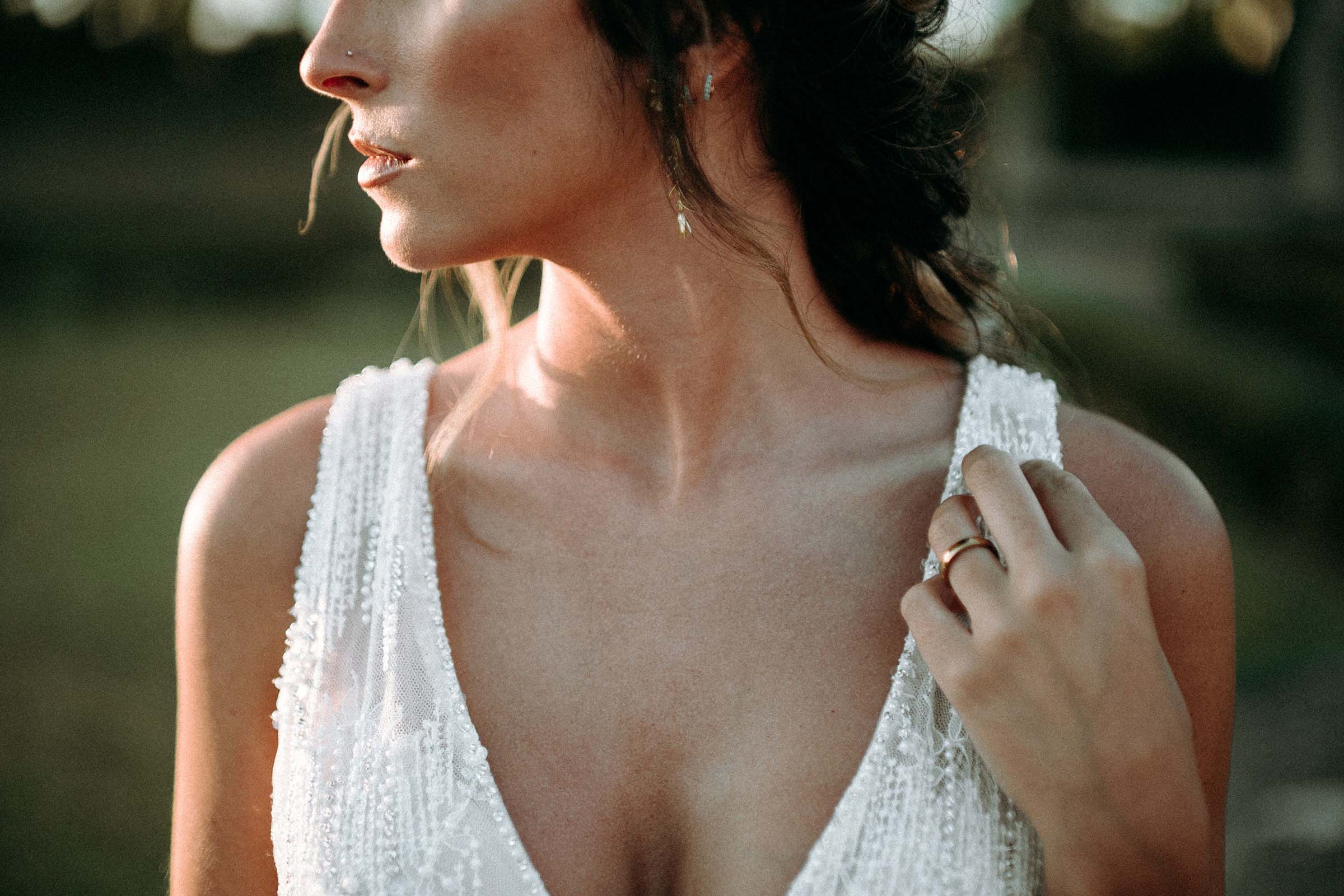 bride cleavage detail looking sideways