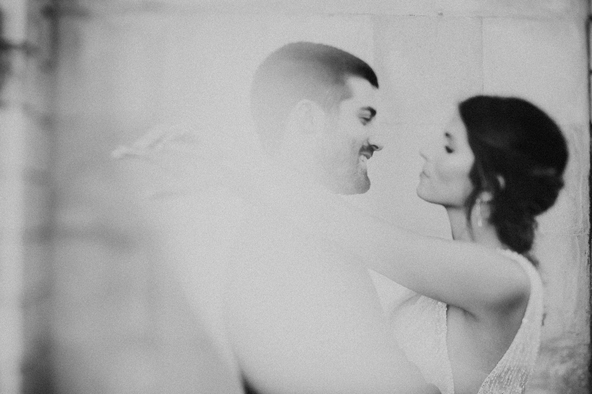 freelens black and white photo with bride hugging groom