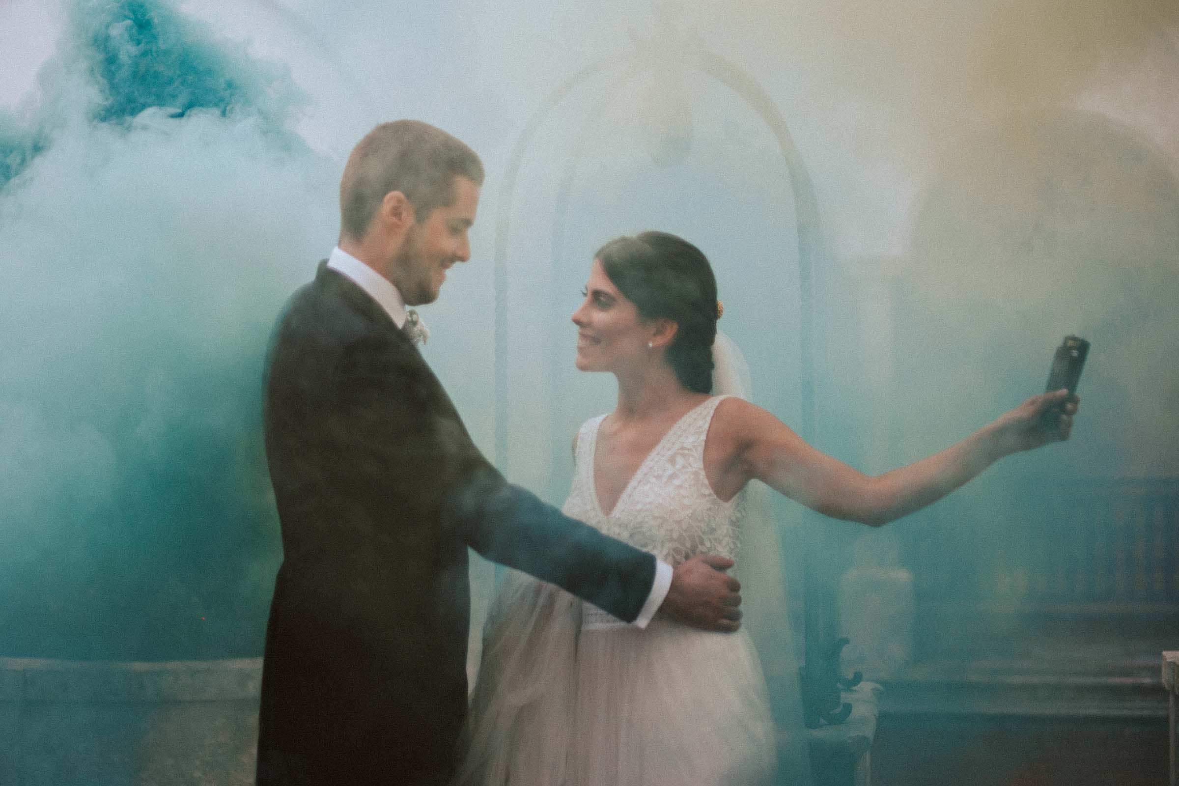 couple dancing in smoke bomb